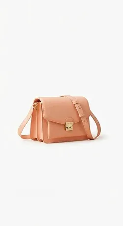 Plain catalog shot of a peach leather shoulder bag before editing with Nano Banana 2.1